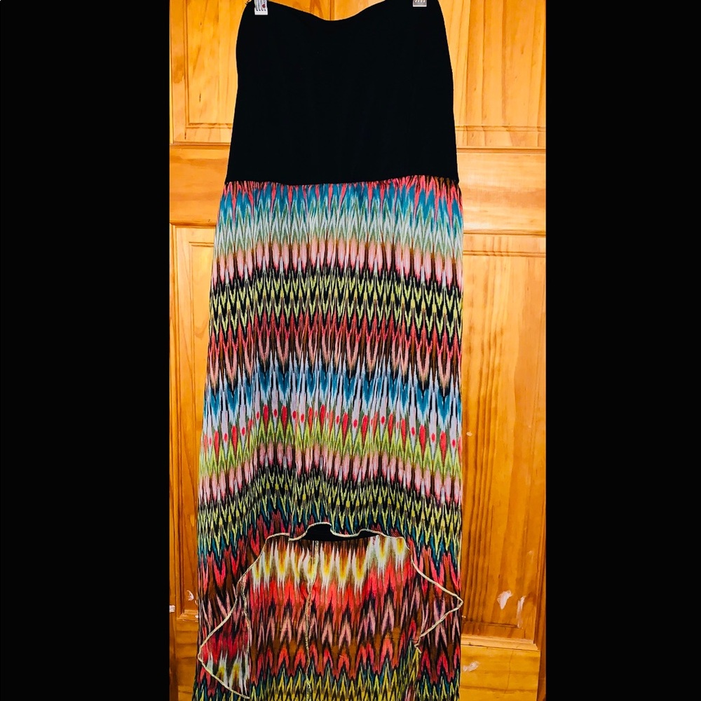 Black tube top flowing colorful bottom dress